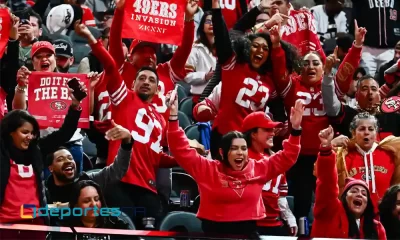 Cheer es fan de San Francisco 49ers, y no faltó al Opening Night el lunes. Foto: Patrick T. Fallon / AFP.