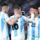 Giovni Lo Celso (segundo a la izquierda) arranca la celebración tras marcar gol para Argentina ante El Salvador, el viernes. Foto: Charly Triballeau / AFP.